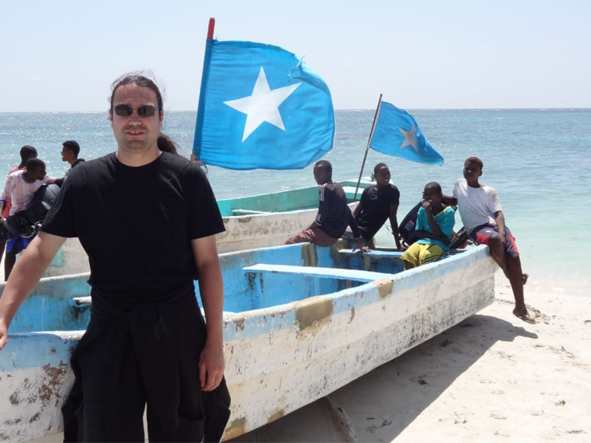 Photographer Chris from Germany capturing scenes at Lido Beach, Mogadishu